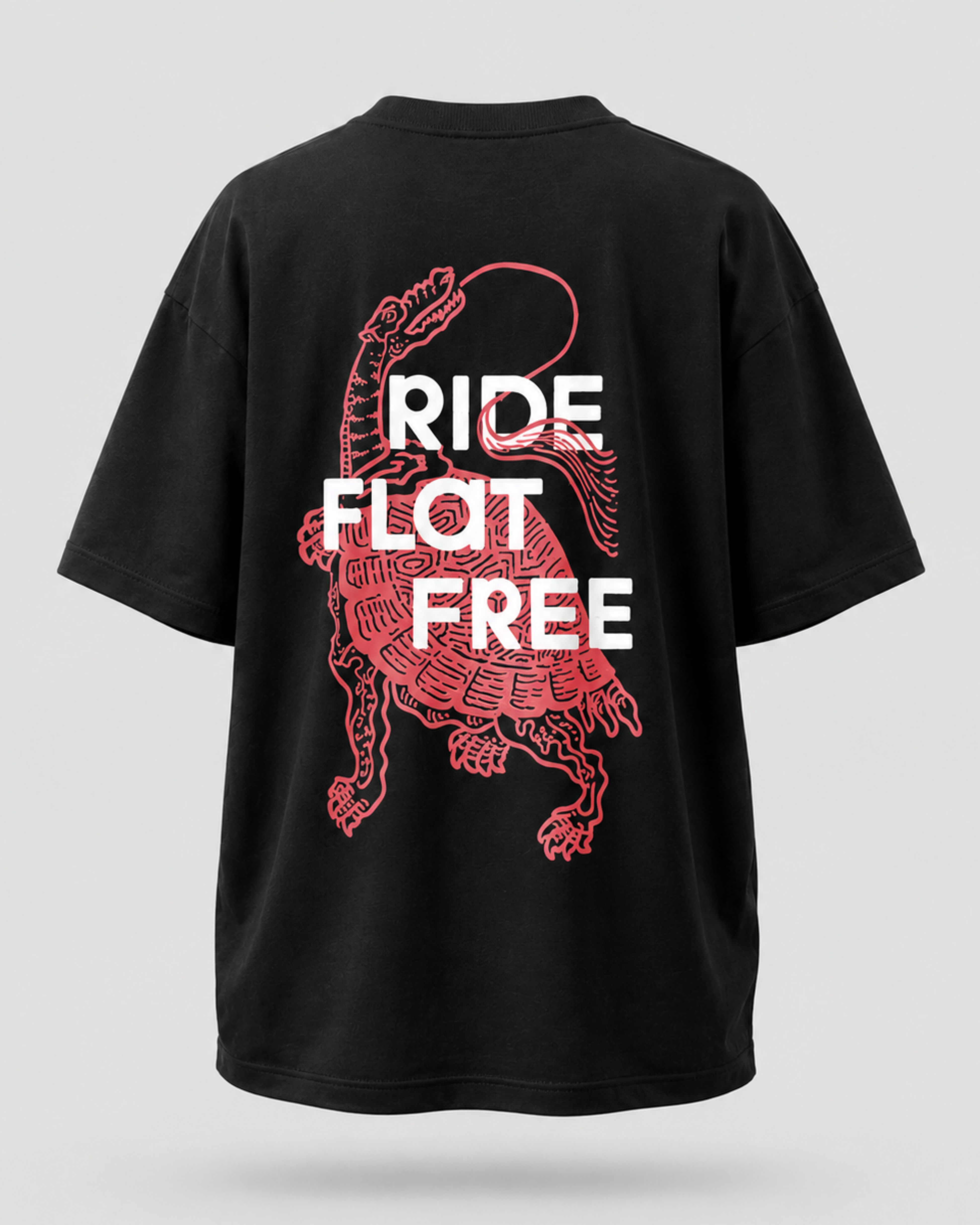 Black t-shirt with red graphic and 'RIDE FLAT FREE' text on a white background