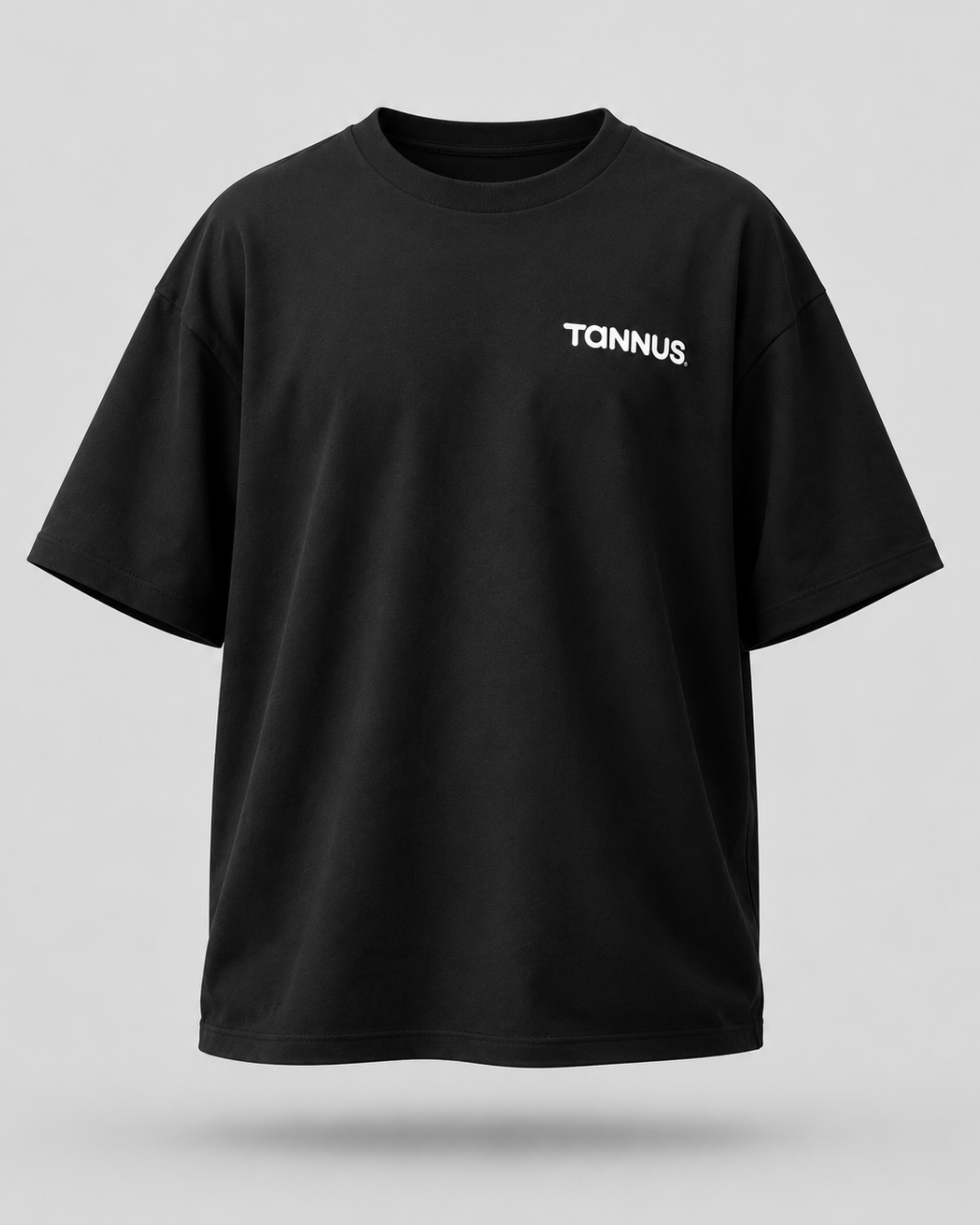 Black t-shirt with 'TANNUS' logo